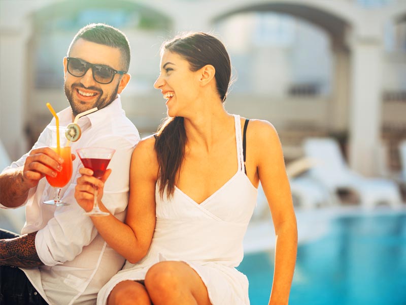 Parents relaxing by the pool